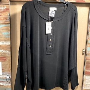Vanilla bay, long sleeve, black top with a butterfly sleeve
